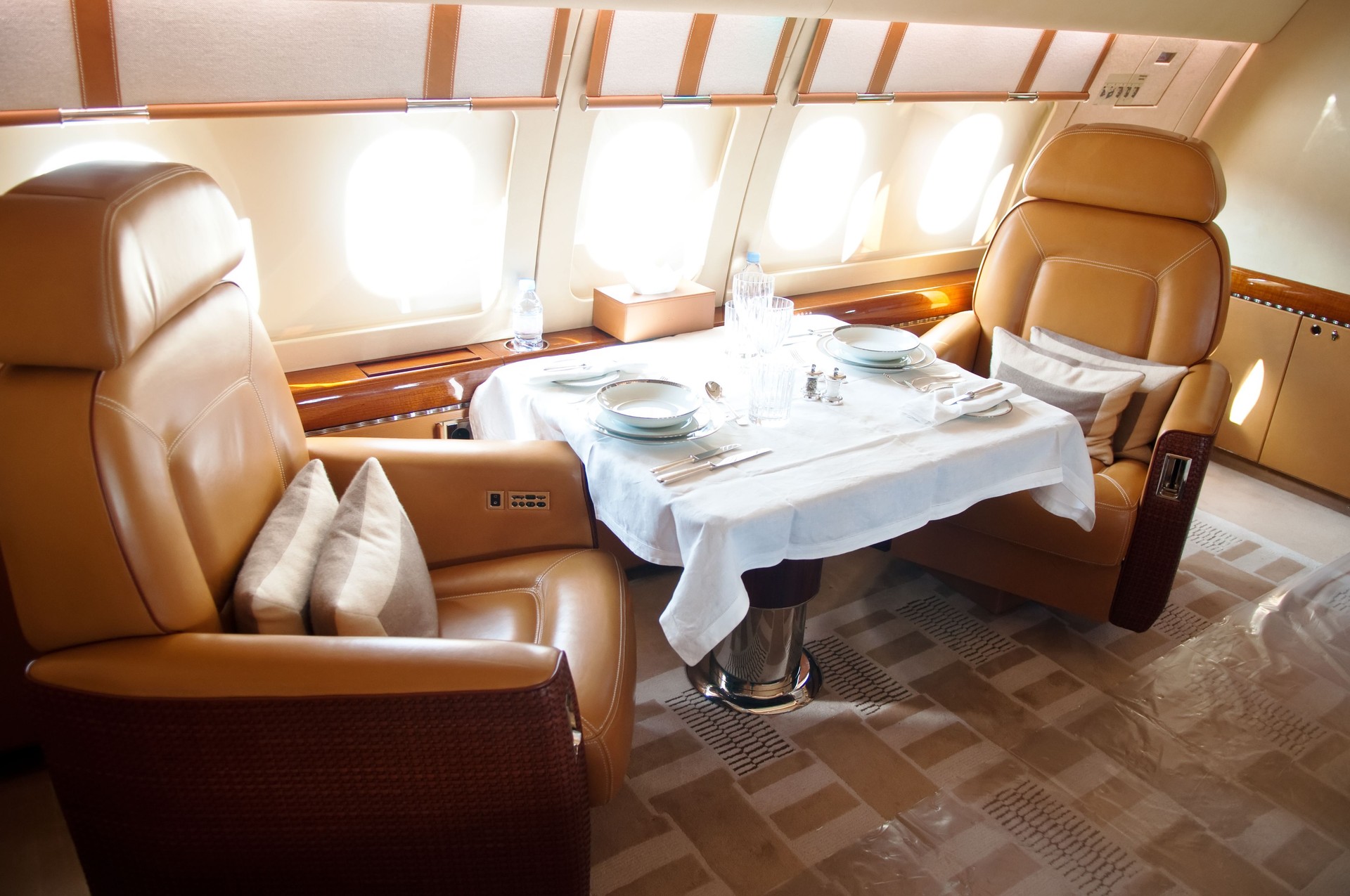 Luxury dining table and chairs onboard a business jet